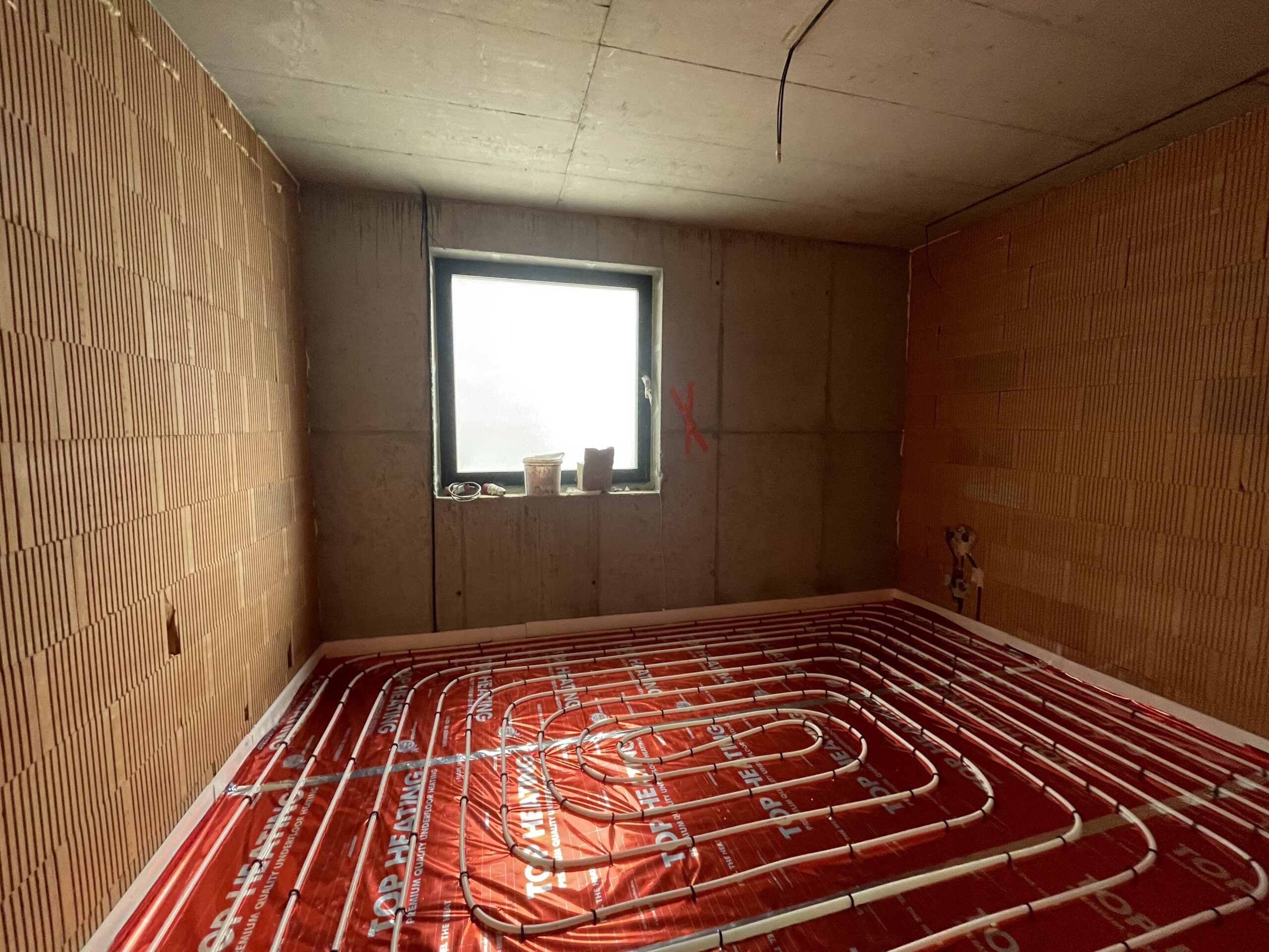 Underfloor heating circuits before the screed is poured