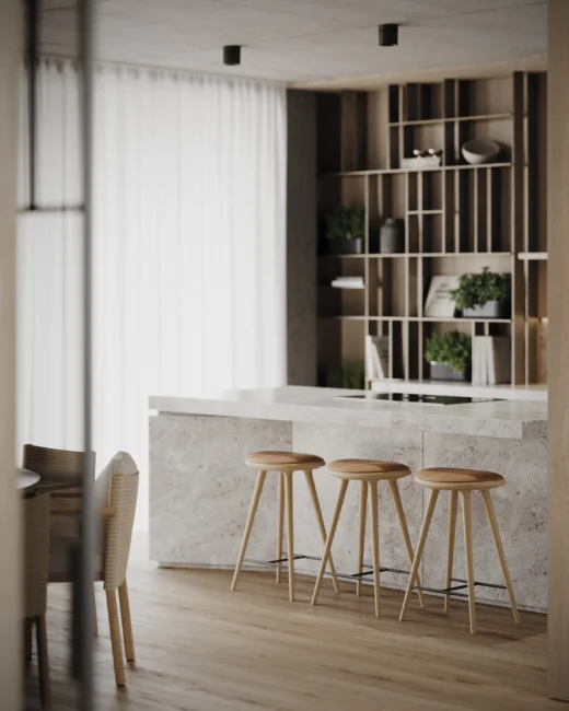 Kuchyňa s ostrovom z prírodného kameňa, barové stoličky, závesné svietidlá a jedálenský stôl pri okne — projekt a realizácia byMOOD